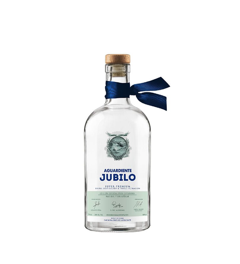 Botella transparente de Aguardiente Júbilo Tradicional de 750 ml con cinta azul en el cuello